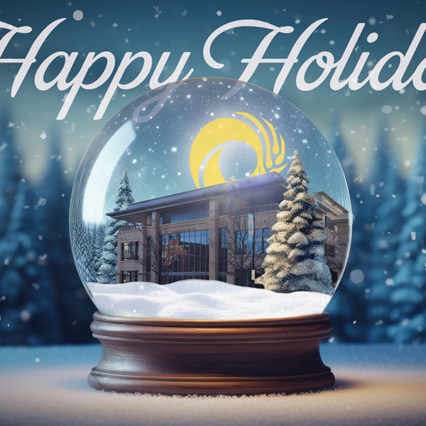 Photo illustration of building inside a snow globe